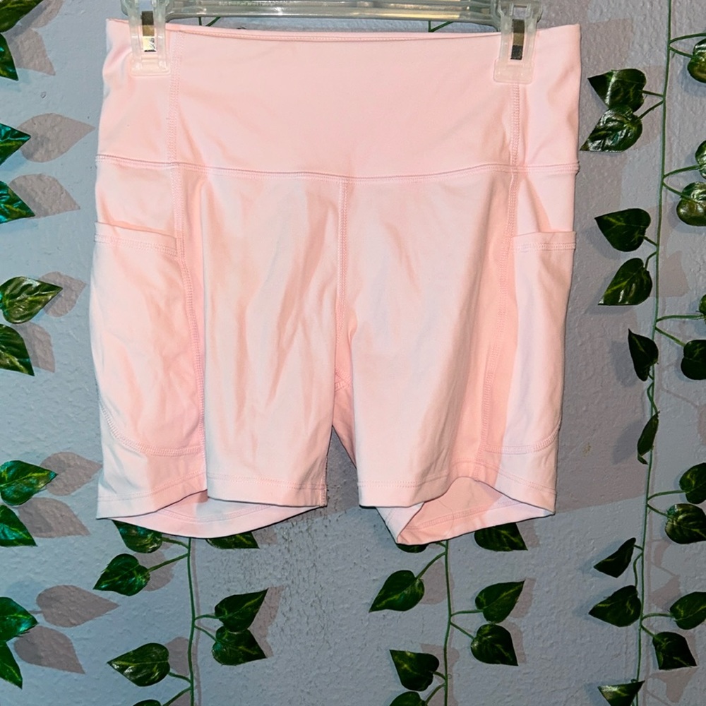 Size medium, pink biker/running shorts with pockets